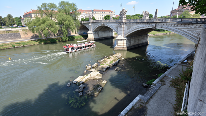 Low water in Rome’s drought-hit Tiber river exposes ancient ruins of Nero’s Bridge