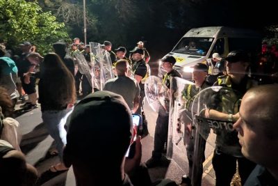 Why are far-right masked men protesting at British ports?